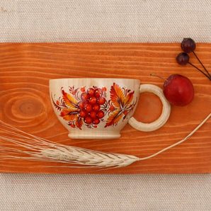 Küche Wanddekoration, schöne Tasse mit orangen Blumen