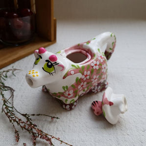 Hand-painted ceramic dairy cow, traditional handicraft