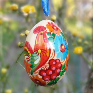 Eco-freindly Easter egg painted with the rooster pattern