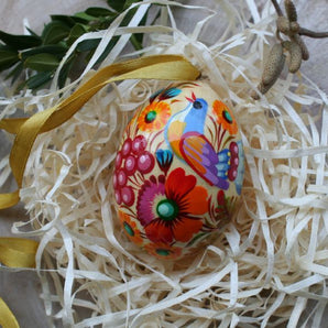 Wooden Easter egg with hand-painted bird