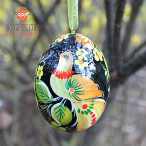 Unique hand painted Easter egg with fantasy bird, made of wood