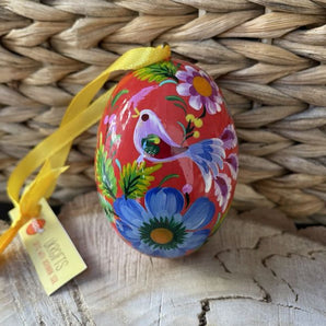 Hand-painted wooden Easter egg with the beautiful bird