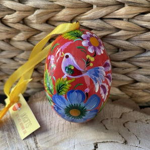 Hand-painted wooden Easter egg with the beautiful bird