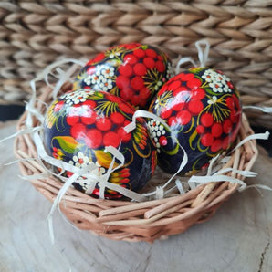 Ukrainian Easter eggs in basket - traditional black painted eggs Pysanky