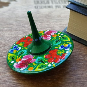 Spinning top, traditional wooden toy with flowers patterns, hand painted in Ukraine