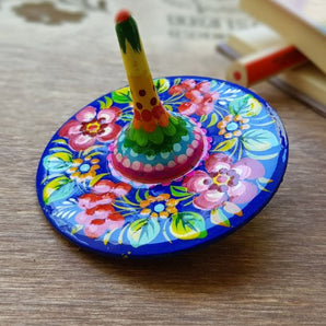 Wooden spinning top, eco toy with traditional ukrainian painting