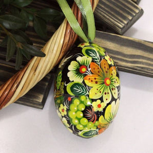 Wooden Easter egg with painted owl, ukrainian pysanka