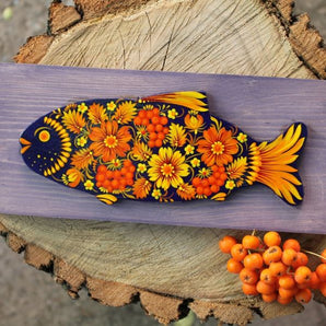 Handcrafted Fish wall decoration on purple wood