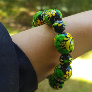 Wooden bracelet with -black and green - from hand painted beads