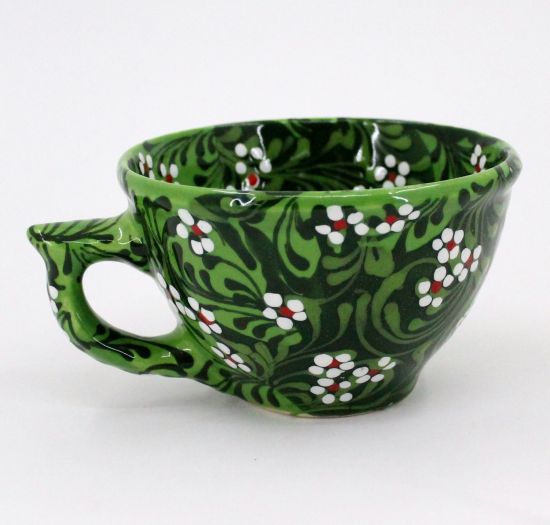 Schöne grüne Kaffeebecher aus Keramik, handbemalt