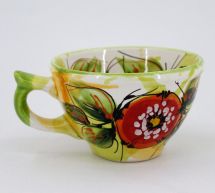 Schöne Teetasse aus Keramik mit Mohnblumen