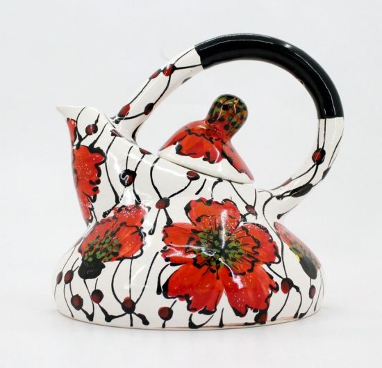 Extravagant ceramic teapot with poppies