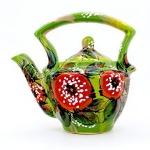 Green ceramic teapot with poppies