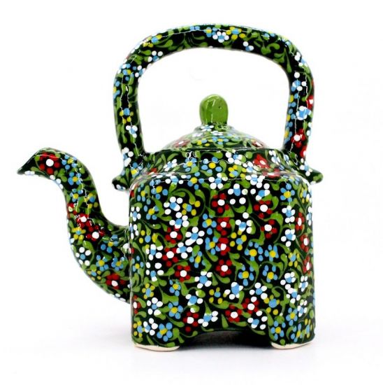 Colorful ceramic teapot with small flowers