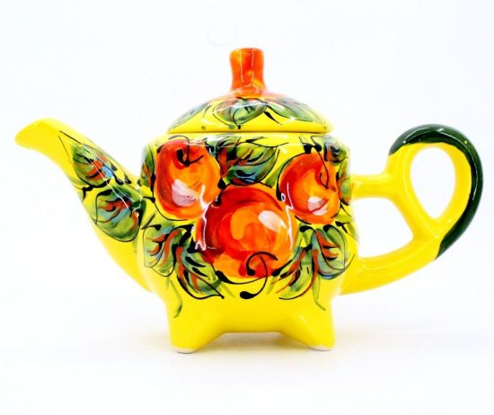 Handmade ceramic teapot with apples