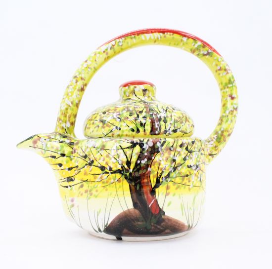 Bunte keramik Teekanne mit Frühlingsmotive