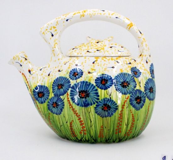 Colorful ceramic teapot with blue flowers