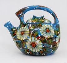 Hand-painted pottery teapot with white flowers