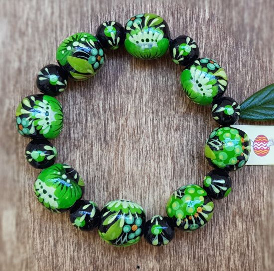 Wooden beaded bracelet with green flowers, handmade folk wooden jewelry