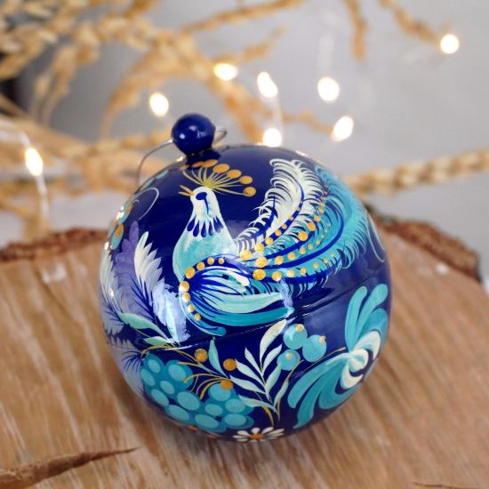 Hand-painted wooden Christmas ball with bird motif