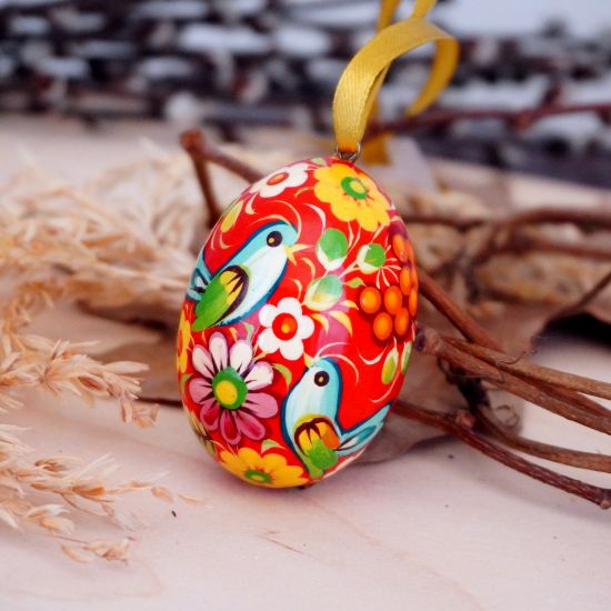 Red wooden Easter hand painted egg, Ukrainian Petrykivka painting