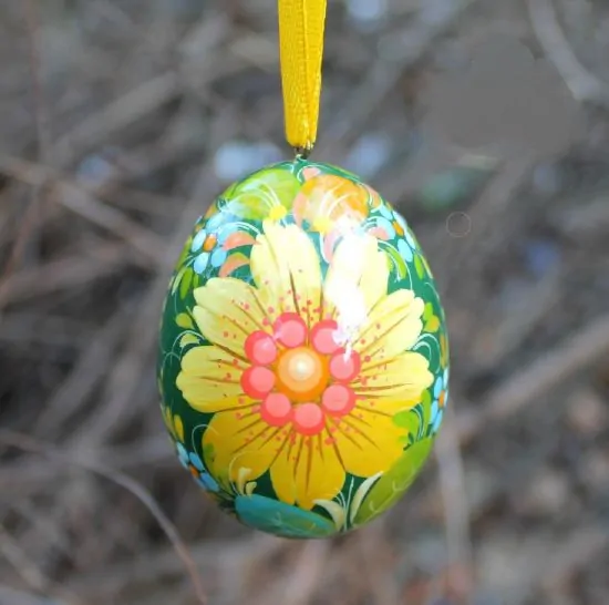 Ukrainian Easter egg hand painted on the wood
