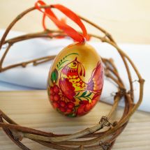 Golden Easter wooden egg with bird motives, hand painted