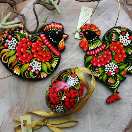 Beautiful Easter ornaments traditional hand painted on wood with flowers patterns