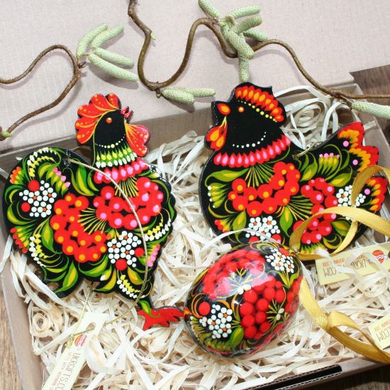 Beautiful Easter ornaments traditional hand painted on wood with flowers patterns