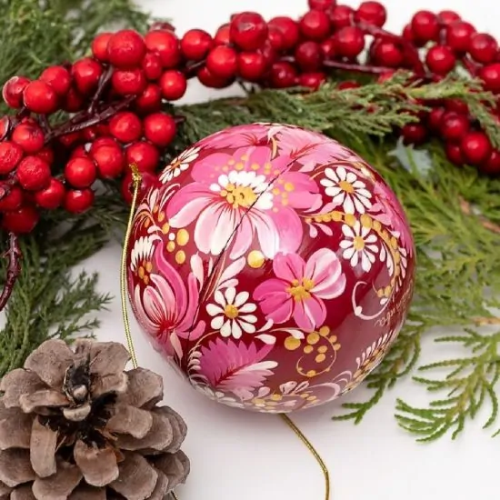Artfull designed wooden Christmas ball with bird motif