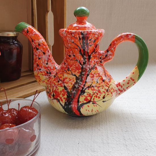 Hand painted ceramic teapot with autumn motive