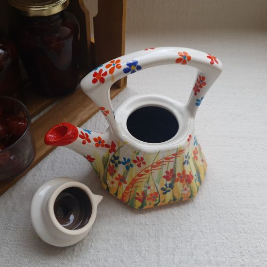 Kleine handbemalte Teekanne aus Keramik mit Blumenmuster