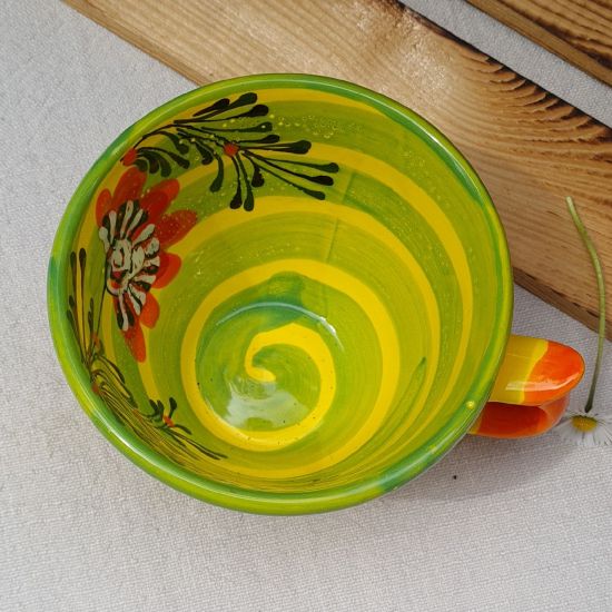 Hand painted ceramic cup with flowers