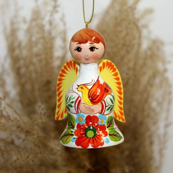 Kleiner Engel aus Holz mit einem Vogel - Weihnachtsglöckchen aus Holz