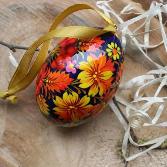 Beautiful wooden Easter egg Pysanka, delicate work