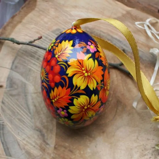 Beautiful wooden Easter egg Pysanka, delicate work