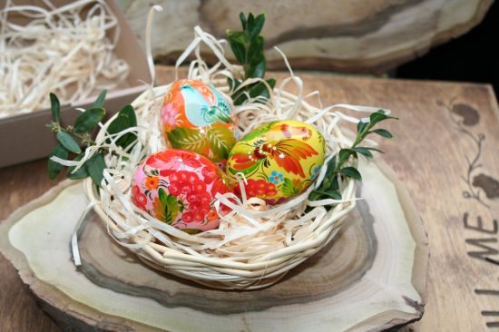 Pretty Easter table decoration - colorful wooden Easter eggs 3 pieces in a basket