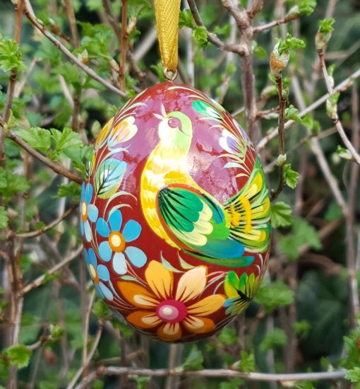 Wooden painted Easter egg, ukrainan pysanky with bird