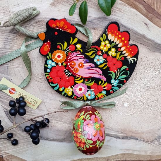 Creative hand painted Easter chicken with an egg -  wooden Easter folk ornaments, black
