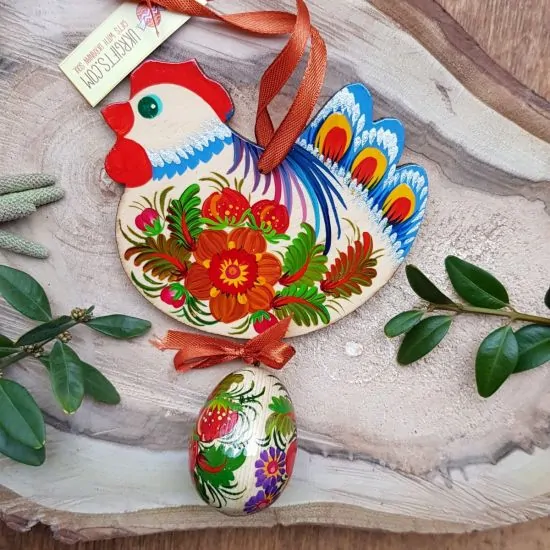 Pretty handmade Easter chicken with an egg -  wooden traditionel Easter ornaments