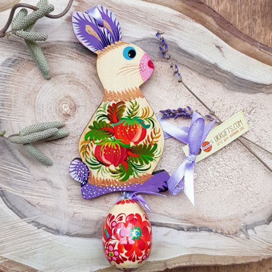 Easter bunny with an egg - hand painted wooden Easter decoration, purple