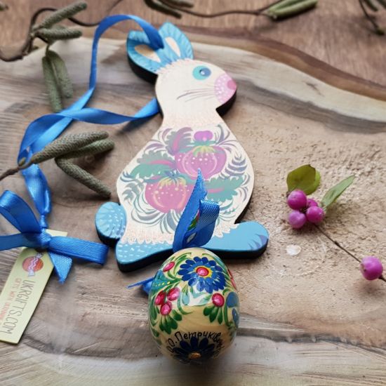 Easter bunny with an egg - hand painted wooden Easter decoration, blue