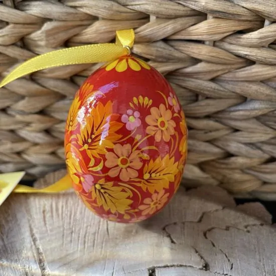 Delicate painted wooden Easter egg, Ukrainian handicraft