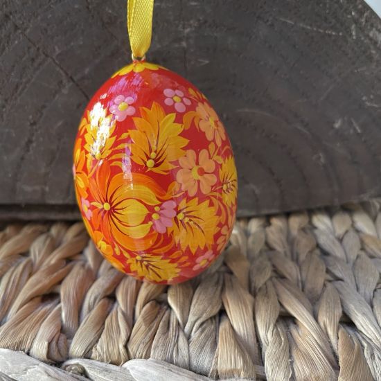 Delicate painted wooden Easter egg, Ukrainian handicraft