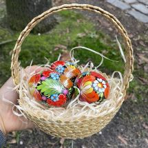 Easter basket filled with hand painted wooden eggs Ukrainian art