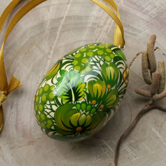 Hand painted wooden Easter egg with butterfly in green