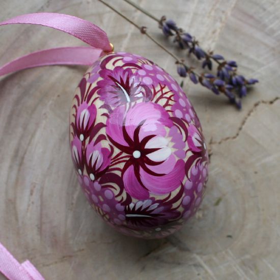 Hand painted wooden Easter egg with butterfly in purple