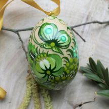 Hand painted wooden Easter egg with butterfly in green