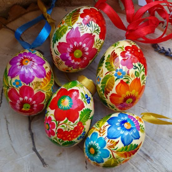 Ukrainian traditional Easter wooden eggs to hang, painted with bird motive