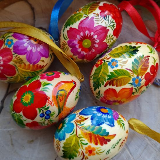 Ukrainian traditional Easter wooden eggs to hang, painted with bird motive